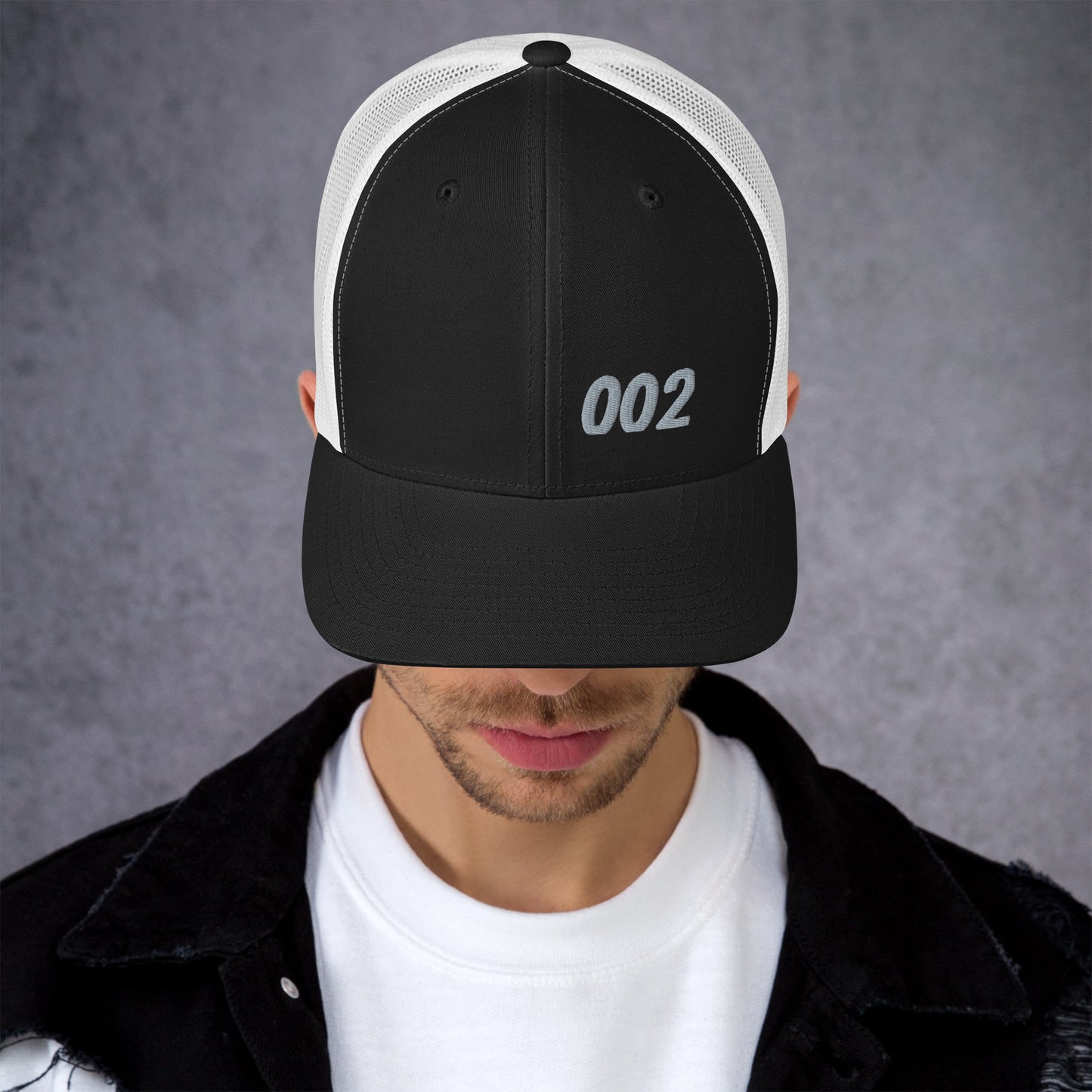 J. 002 Trucker Cap