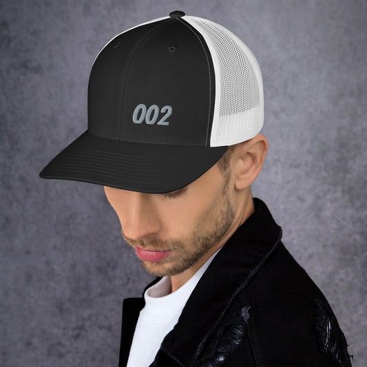 J. 002 Trucker Cap